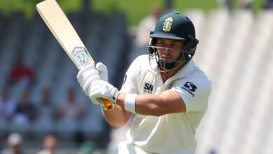 Josh Cobb playing cricket in professional attire